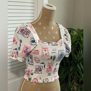 Monteau crop top short puff sleeves smocked and full of fun prints Sz M